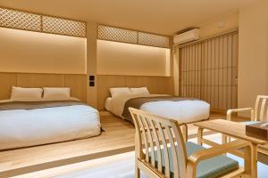 Krevet ili kreveti u jedinici u objektu Konjaku-So Tempozan Osaka Bay -Universal Bay Area-