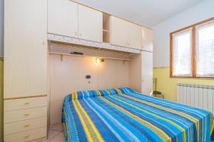 Posteľ alebo postele v izbe v ubytovaní Apartment in villa 2 to 3 persons with large private garden
