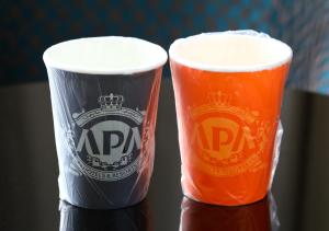 two cups of beer sitting next to each other at APA Hotel Hakata Higashihieekimae in Fukuoka