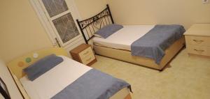 En eller flere senger på et rom på Room in Apartment - Kadinlar Denizi Ev 31