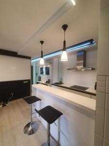Kuchyňa alebo kuchynka v ubytovaní Bungalows del Golf Almerimar + 6 fotografií