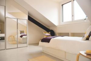Ліжко або ліжка в номері One Only nassa Suite Apartment