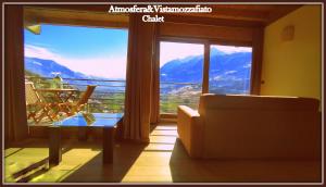 Foto da galeria de CHALET con VISTA MONTAGNE em Aosta