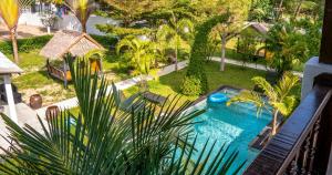 an aerial view of a backyard with a swimming pool at Aqua Suites in Wok Tum