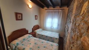 Postel nebo postele na pokoji v ubytování Casa Duje, Casa para 7 en plenos Picos de Europa - CA-930-AS
