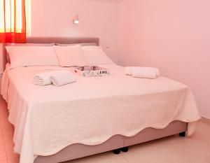Postel nebo postele na pokoji v ubytování Cvita apartments