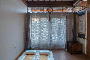 Postel nebo postele na pokoji v ubytování Aega Hanok Guesthouse