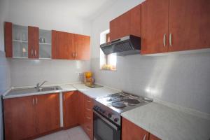 Kuchyňa alebo kuchynka v ubytovaní Apartments and Room Agata
