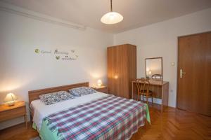 Posteľ alebo postele v izbe v ubytovaní Apartments and Room Agata