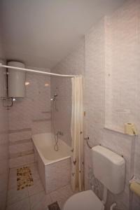 Kúpeľňa v ubytovaní Apartments and Room Agata