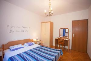 Posteľ alebo postele v izbe v ubytovaní Apartments and Room Agata