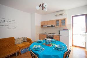 Kuchyňa alebo kuchynka v ubytovaní Apartments and Room Agata