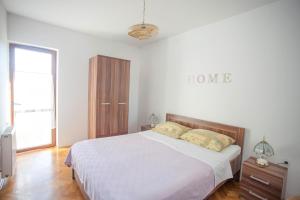Posteľ alebo postele v izbe v ubytovaní Apartments and Room Agata