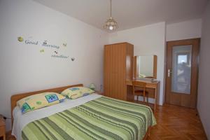 Posteľ alebo postele v izbe v ubytovaní Apartments and Room Agata