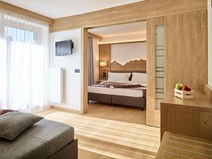 Postel nebo postele na pokoji v ubytování Hotel Shandranj