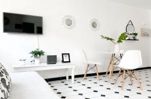 TV a/nebo společenská místnost v ubytování Central House