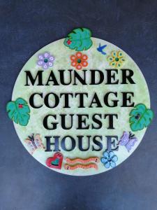 Maunder Cottage في ألدينجا: كعكة مكتوب عليها بيت ضيافة عضو المؤتمرات