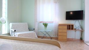 TV a/nebo společenská místnost v ubytování Villa Grace Felice