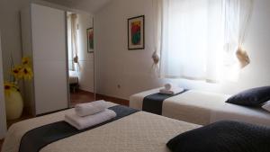 Postel nebo postele na pokoji v ubytování Villa Grace Felice + 37 fotografií