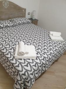 Postel nebo postele na pokoji v ubytování Holiday House Palau