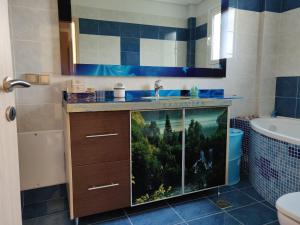 A bathroom at Dimitris Vaso’s Villa with Sea and Mountain View!