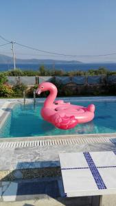 The swimming pool at or close to Dimitris Vaso’s Villa with Sea and Mountain View!