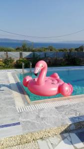 The swimming pool at or close to Dimitris Vaso’s Villa with Sea and Mountain View!