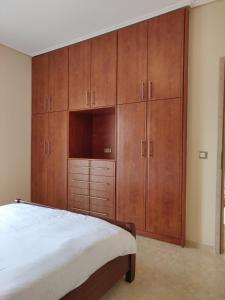 A bed or beds in a room at Dimitris Vaso’s Villa with Sea and Mountain View!