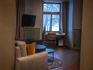 TV a/nebo společenská místnost v ubytování Hotel Fredrikstad