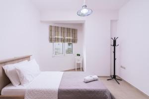 Postel nebo postele na pokoji v ubytování Villa Perahori