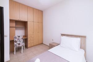Postel nebo postele na pokoji v ubytování Villa Perahori