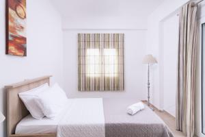 Postel nebo postele na pokoji v ubytování Villa Perahori
