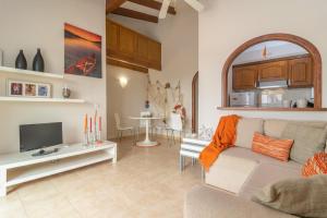 TV a/nebo společenská místnost v ubytování Ca Minorica -Apartamento-