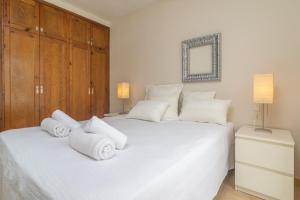 Postel nebo postele na pokoji v ubytování Ca Minorica -Apartamento-