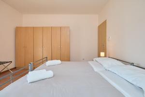 Posteľ alebo postele v izbe v ubytovaní Apartment Marijana