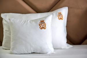 Postel nebo postele na pokoji v ubytování HOTEL ADRIANO
