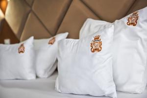 Postel nebo postele na pokoji v ubytování HOTEL ADRIANO