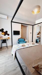 Posteľ alebo postele v izbe v ubytovaní Cuore Mio B&b