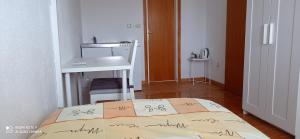 Postel nebo postele na pokoji v ubytování Apartmani Barišić