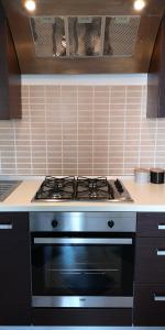 Kuchyň nebo kuchyňský kout v ubytování APARTMENT IZABELA Opatija