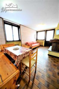 Posteľ alebo postele v izbe v ubytovaní Baite Costaccia App 3 by Livigno Accomodation