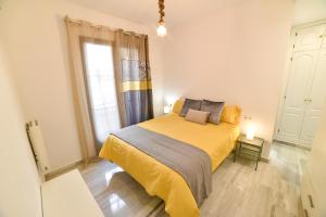 A bed or beds in a room at New! City Centre Apartment
