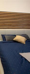 Posteľ alebo postele v izbe v ubytovaní Apartmán Lara
