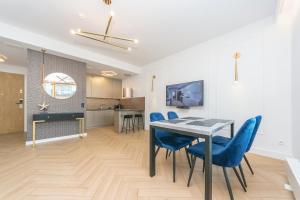 Kuchyňa alebo kuchynka v ubytovaní Pomorskie Apartamenty Bernadowska Gold