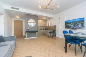 Kuchyňa alebo kuchynka v ubytovaní Pomorskie Apartamenty Bernadowska Gold