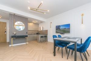 Kuchyňa alebo kuchynka v ubytovaní Pomorskie Apartamenty Bernadowska Gold