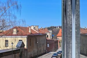 a view from a window of a city with buildings at cohost I New Bastėja Life Apartments w-Garage Prkg & Self Check-in in Vilnius