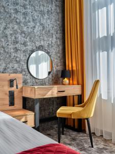 Posteľ alebo postele v izbe v ubytovaní 1891 Garni Hotel
