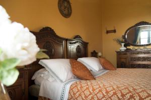Postel nebo postele na pokoji v ubytování B&B Casa Carla