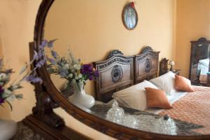 Postel nebo postele na pokoji v ubytování B&B Casa Carla